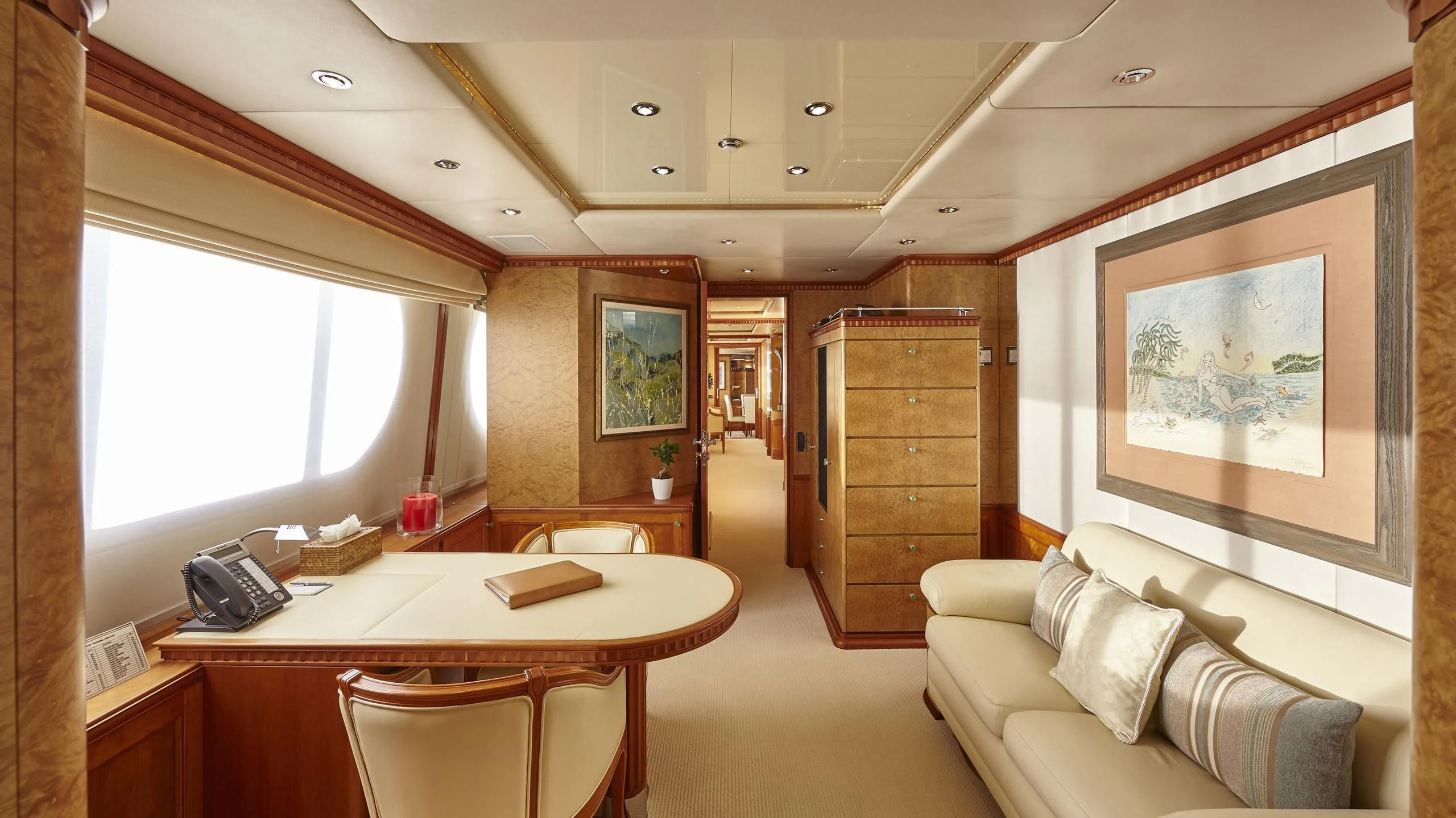 a room with a table and chairs aboard AZUL V Yacht for Charter