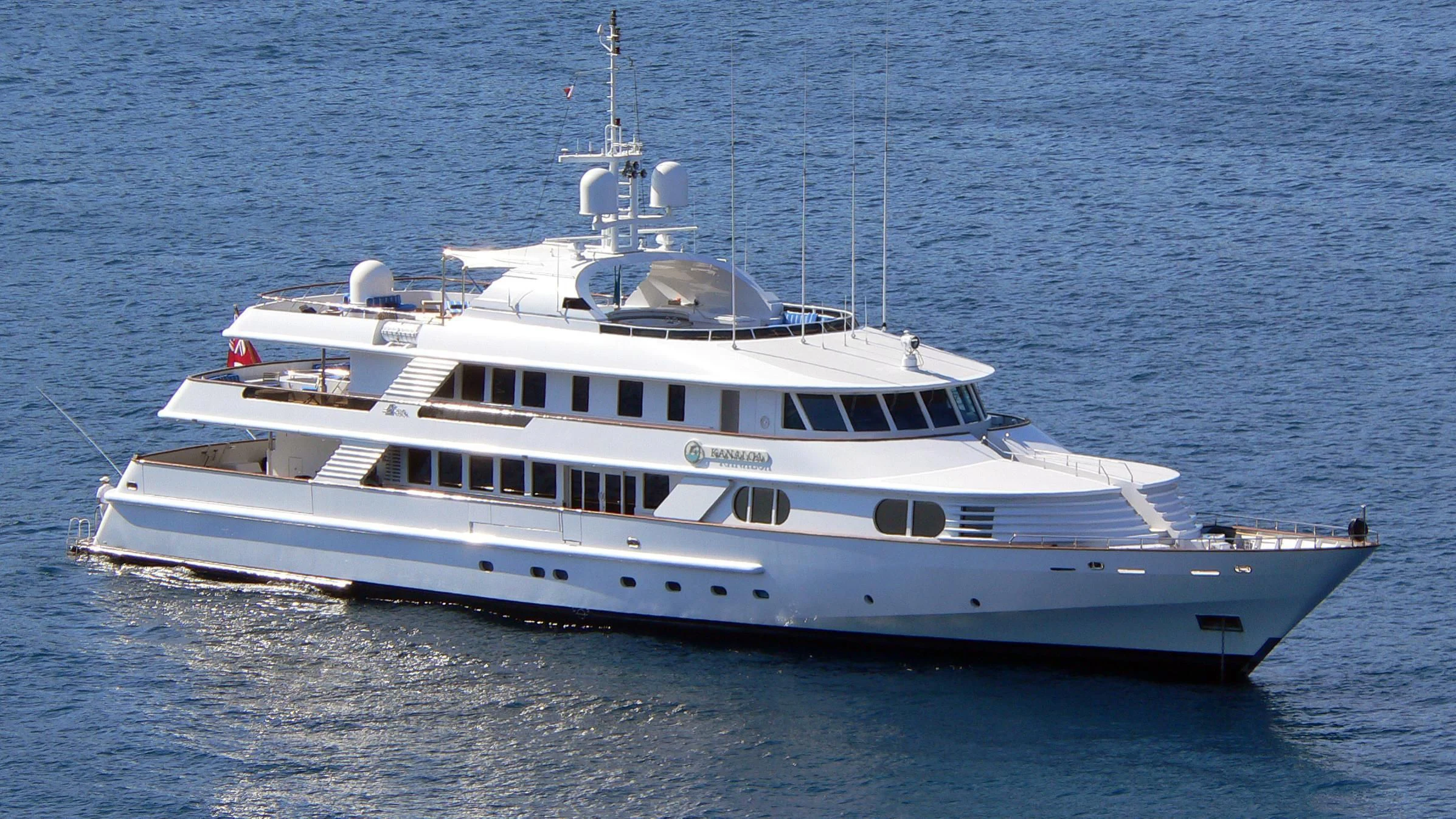 a white boat in the water aboard AZUL V Yacht for Charter