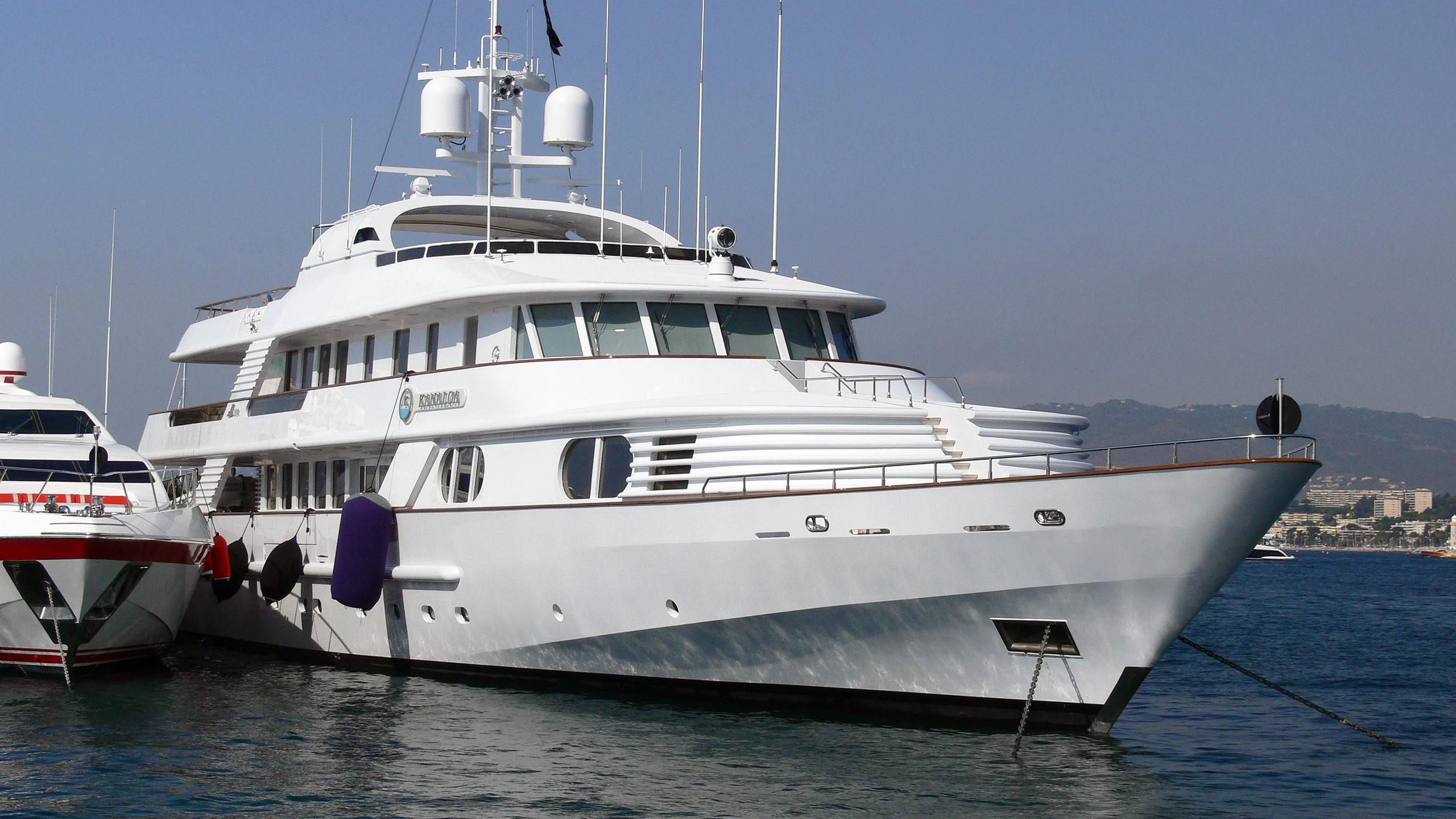 a couple of boats in the water aboard AZUL V Yacht for Charter