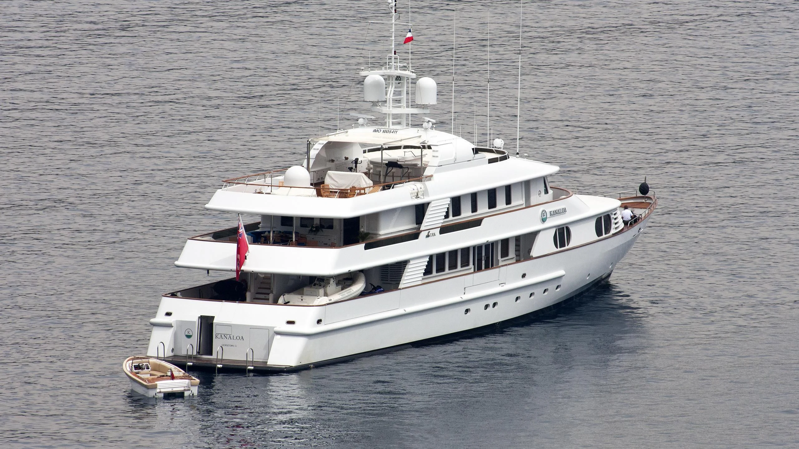 a large white boat in the water aboard AZUL V Yacht for Charter