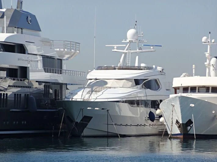 a group of boats are parked in a harbor aboard IRAVATI Yacht for Sale
