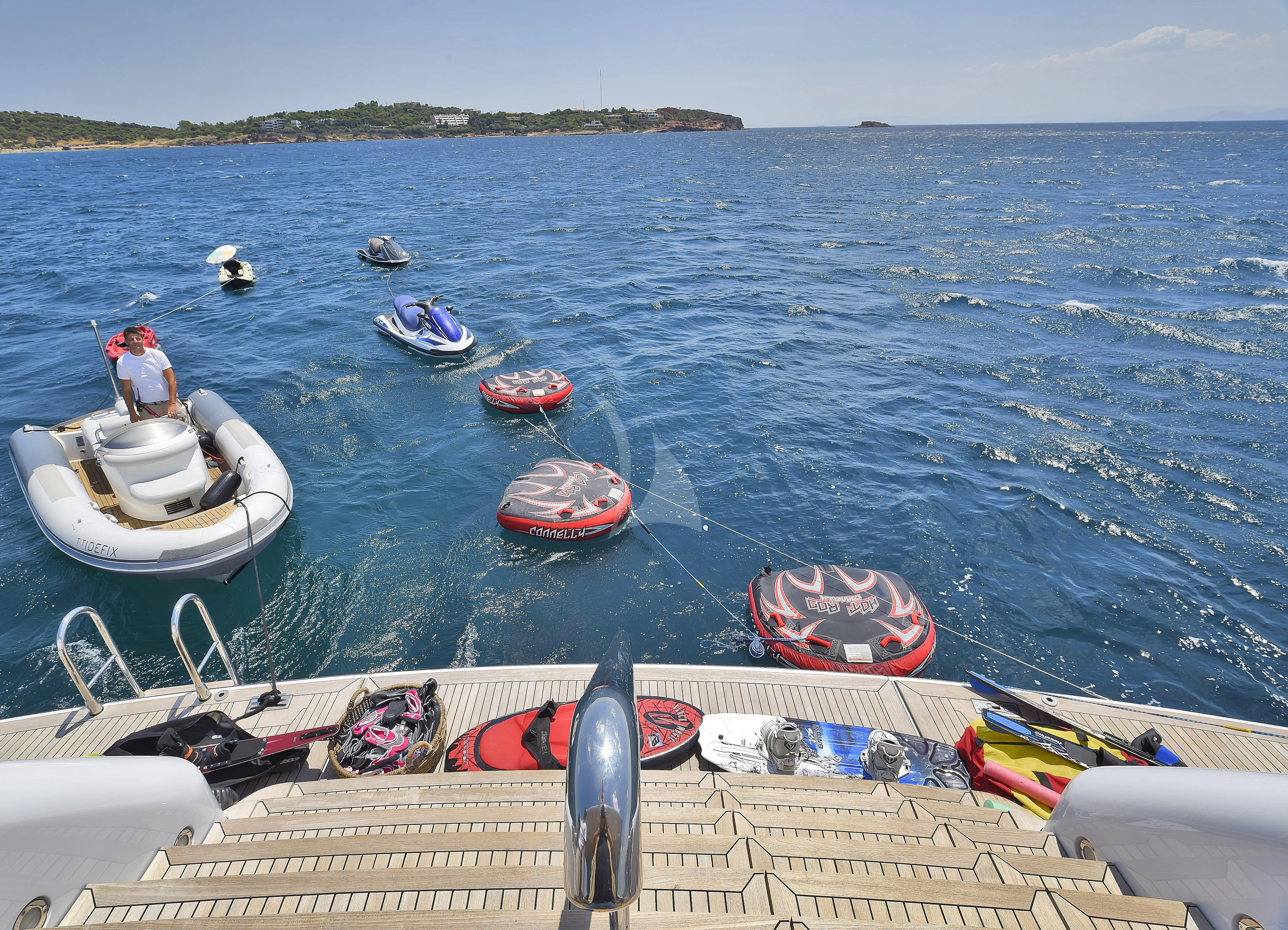 a person on a boat in the water aboard IRAVATI Yacht for Sale