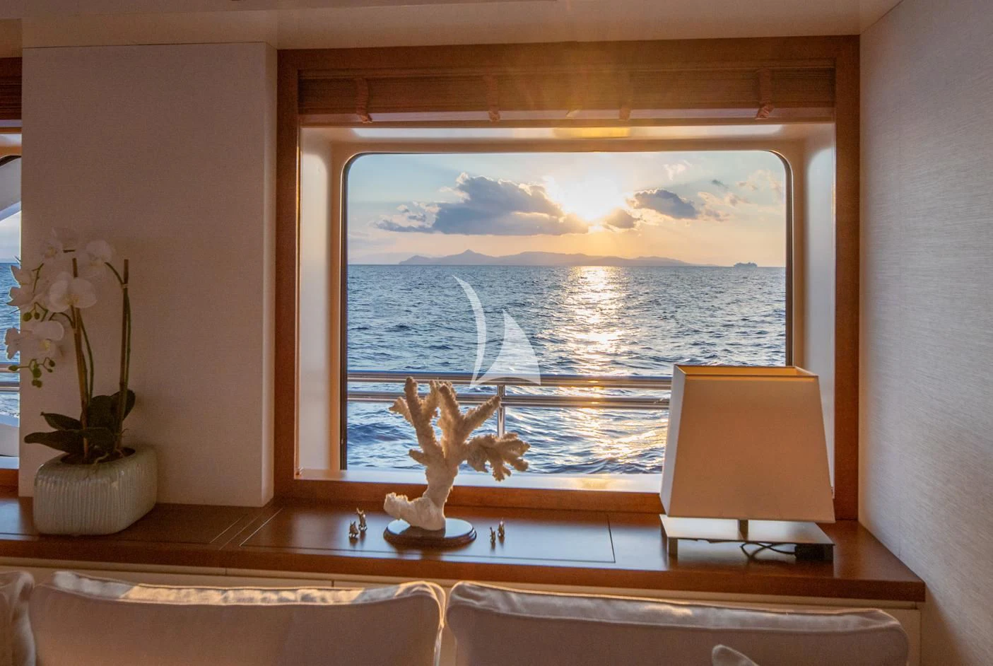 a window with a deer statue aboard IRAVATI Yacht for Sale