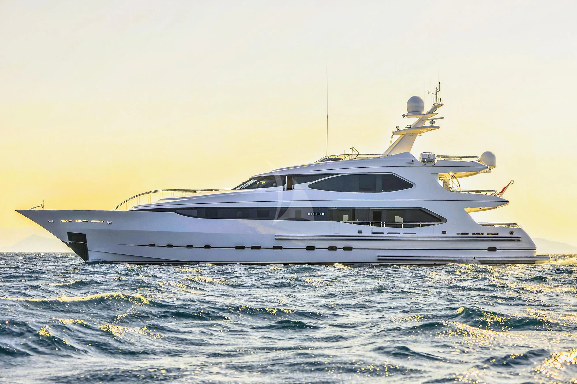 a white yacht in the water aboard IRAVATI Yacht for Sale