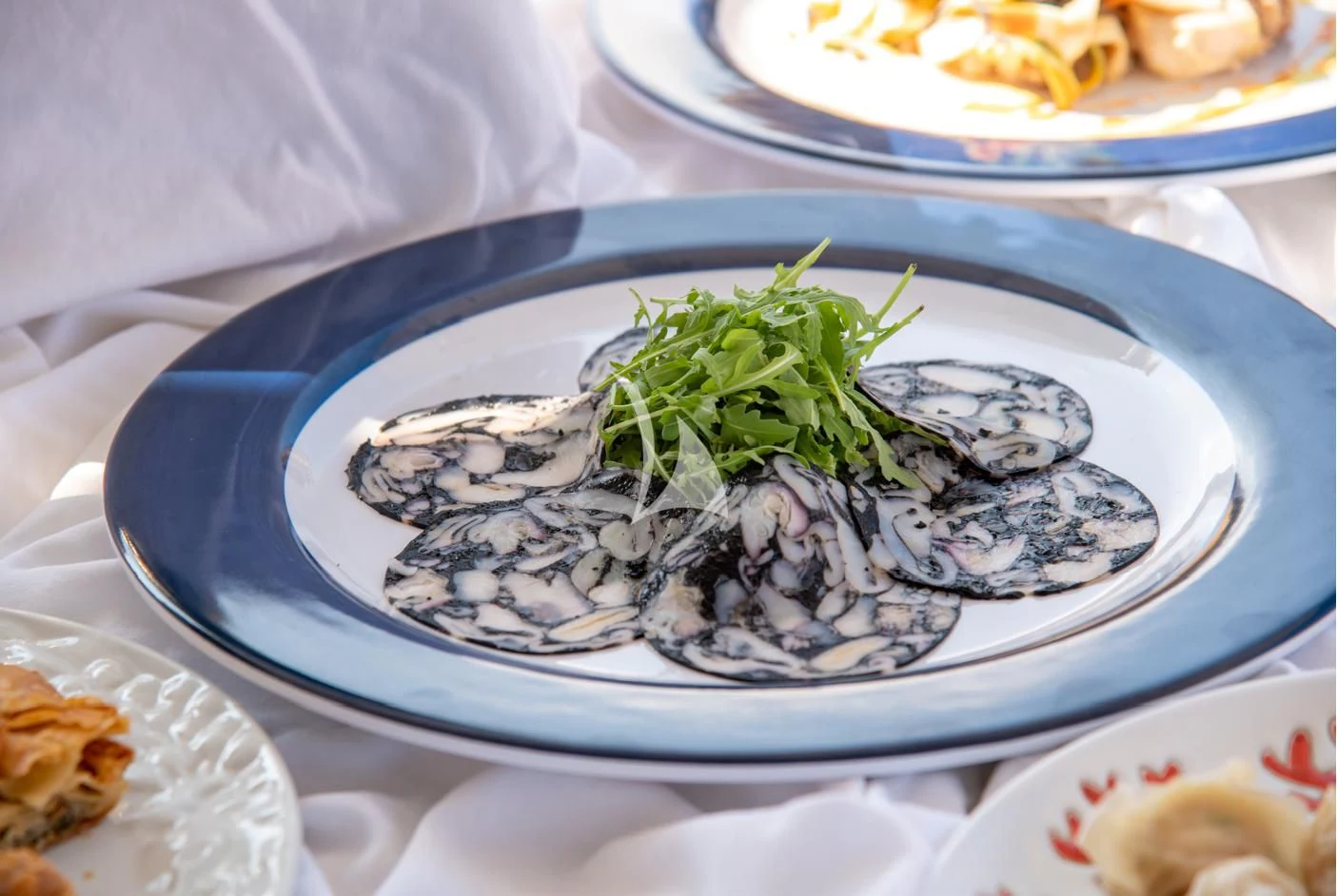 a plate of food aboard IRAVATI Yacht for Sale