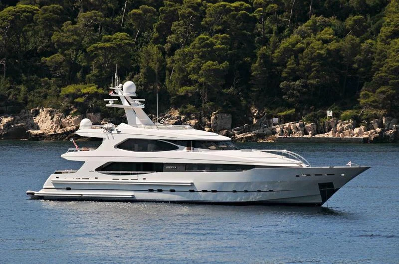 a white yacht in the water aboard IRAVATI Yacht for Sale