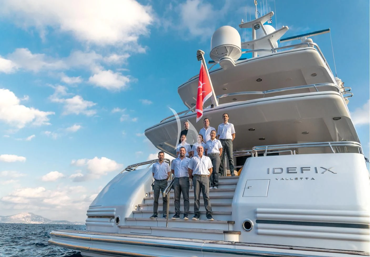 a group of people on a boat aboard IRAVATI Yacht for Sale