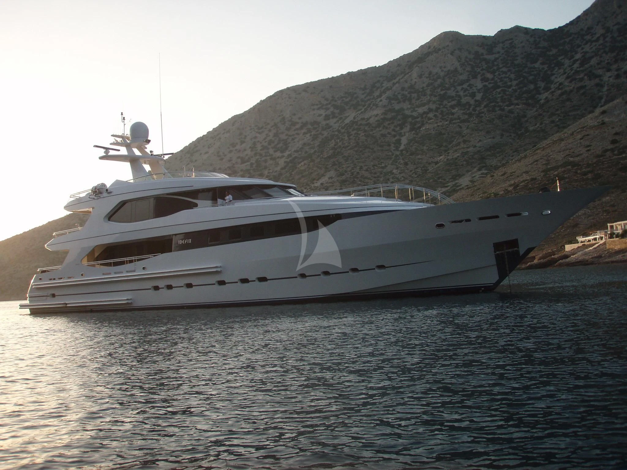 a white yacht on the water aboard IRAVATI Yacht for Sale