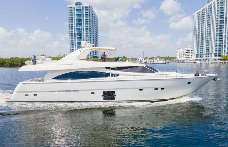a white yacht in the water aboard UNFORGETTABLE Yacht for Sale