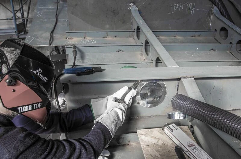a person wearing a helmet and gloves aboard BRAVISSIMA Yacht for Sale