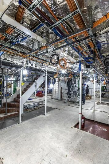 a large room with a large display of bikes and bikes aboard BRAVISSIMA Yacht for Sale