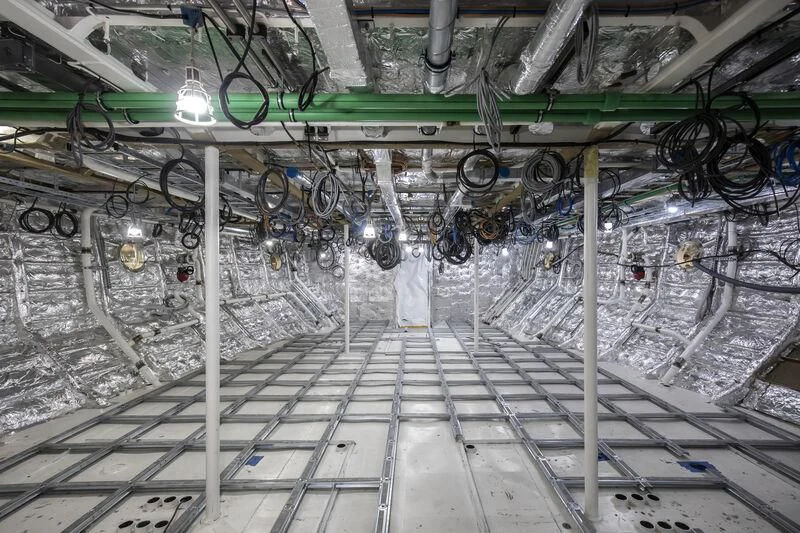 a large room with pipes and pipes aboard BRAVISSIMA Yacht for Sale
