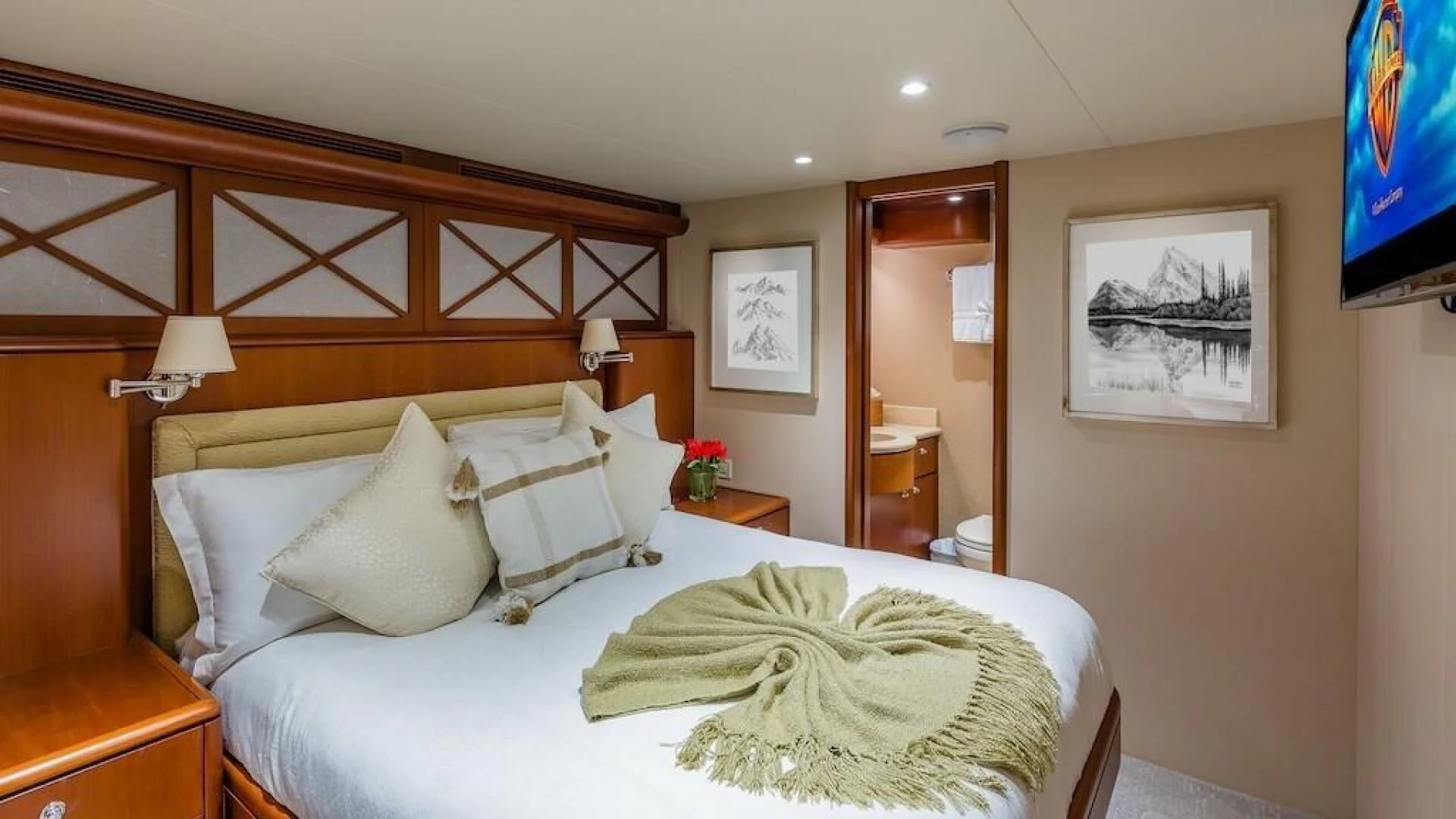 a bed with pillows on it aboard LADY LORRAINE Yacht for Sale