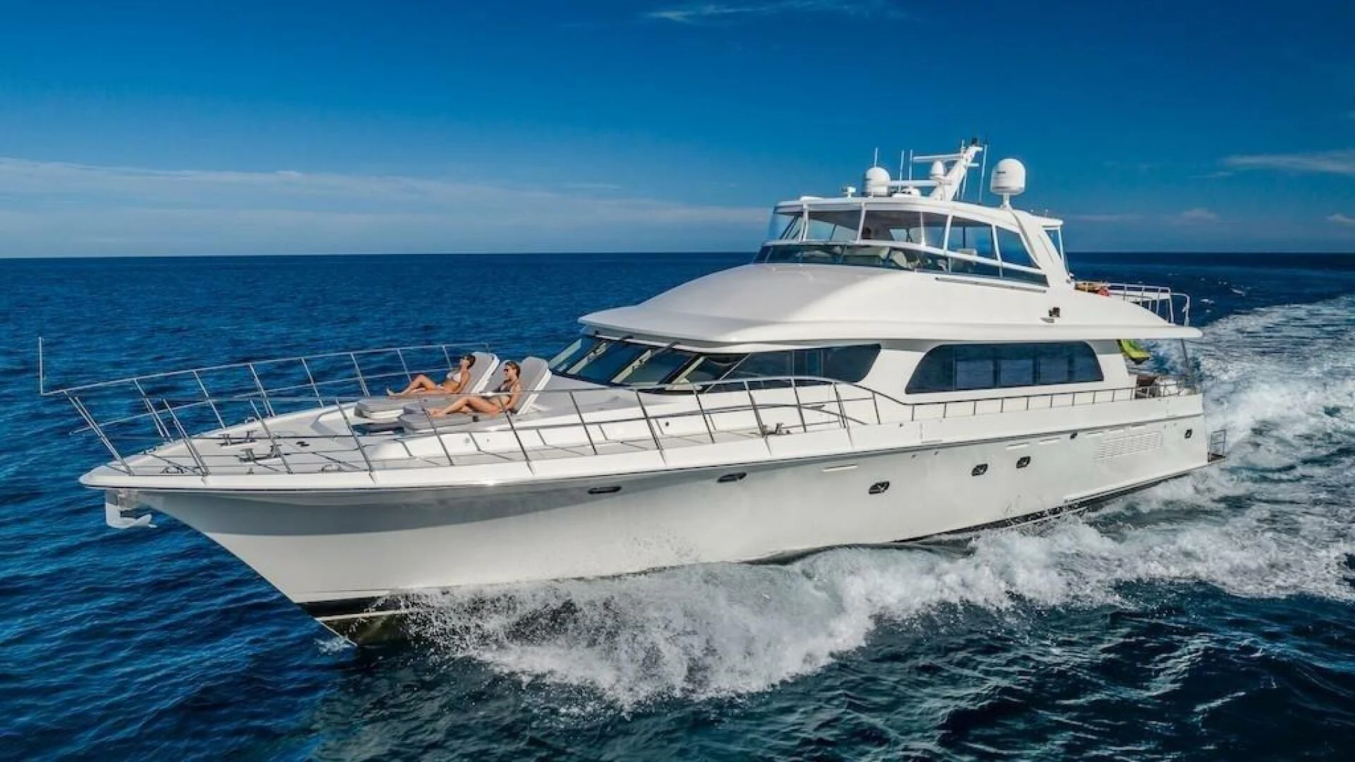 a white yacht on the water aboard LADY LORRAINE Yacht for Sale