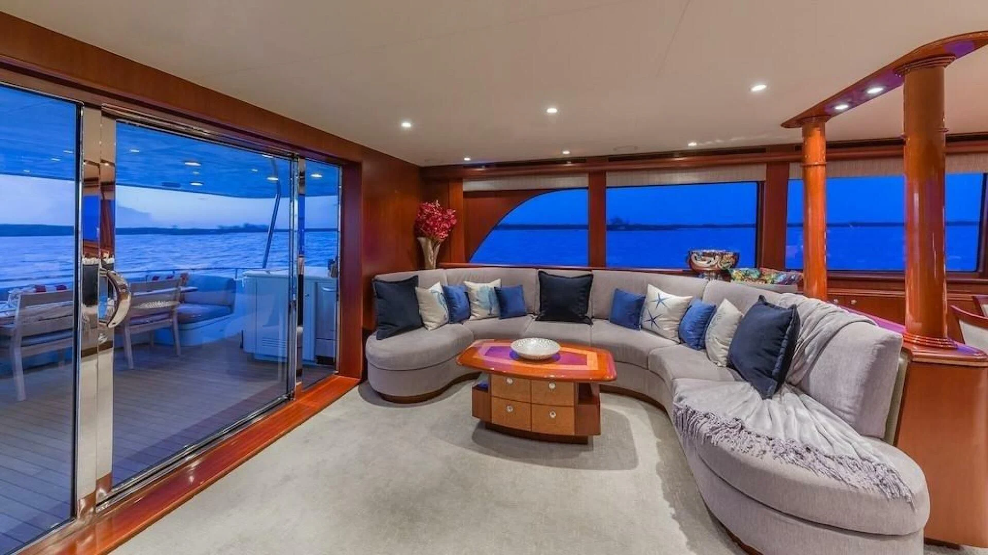 a living room with a large window aboard LADY LORRAINE Yacht for Sale