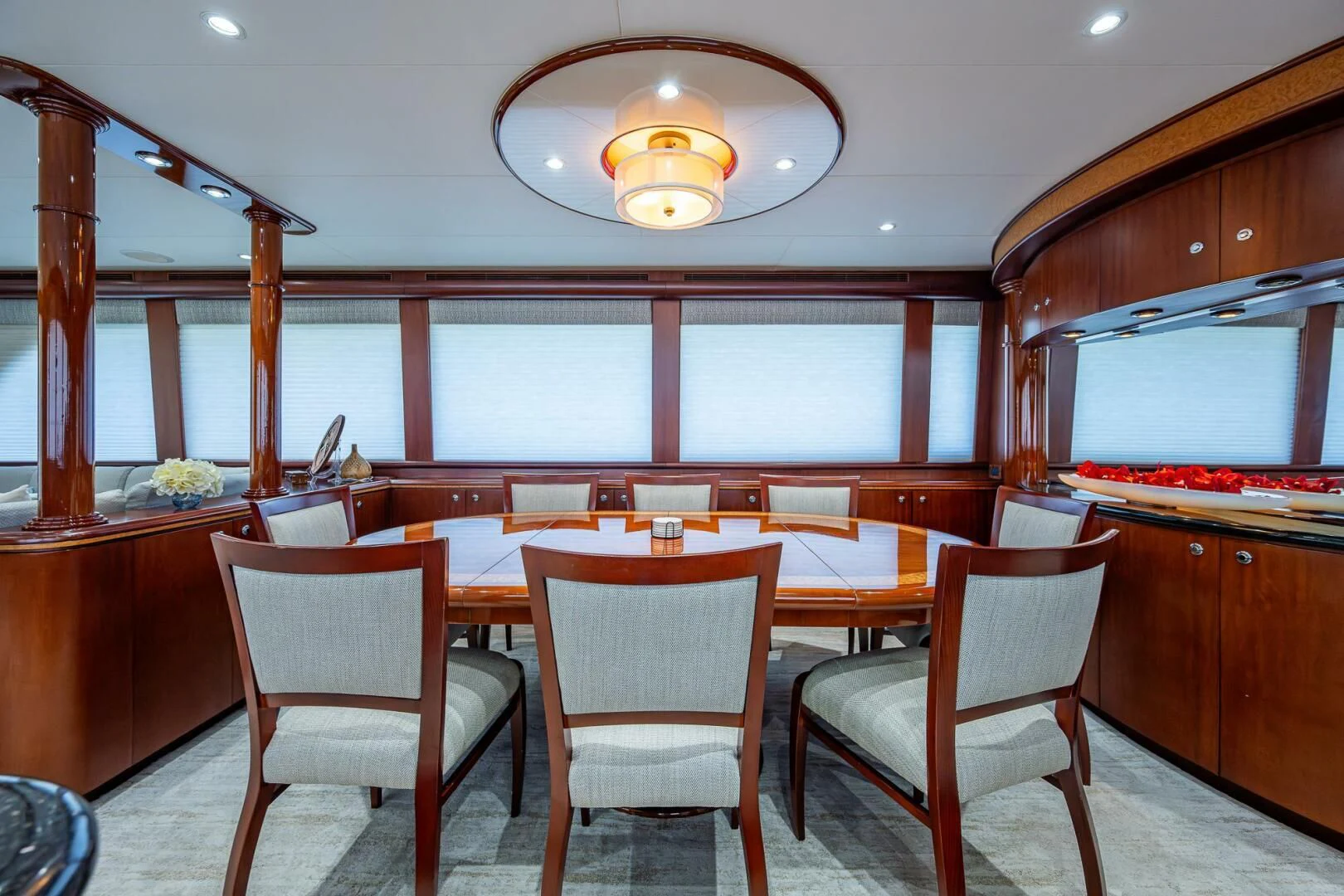 a kitchen with a table and chairs aboard LADY LORRAINE Yacht for Sale
