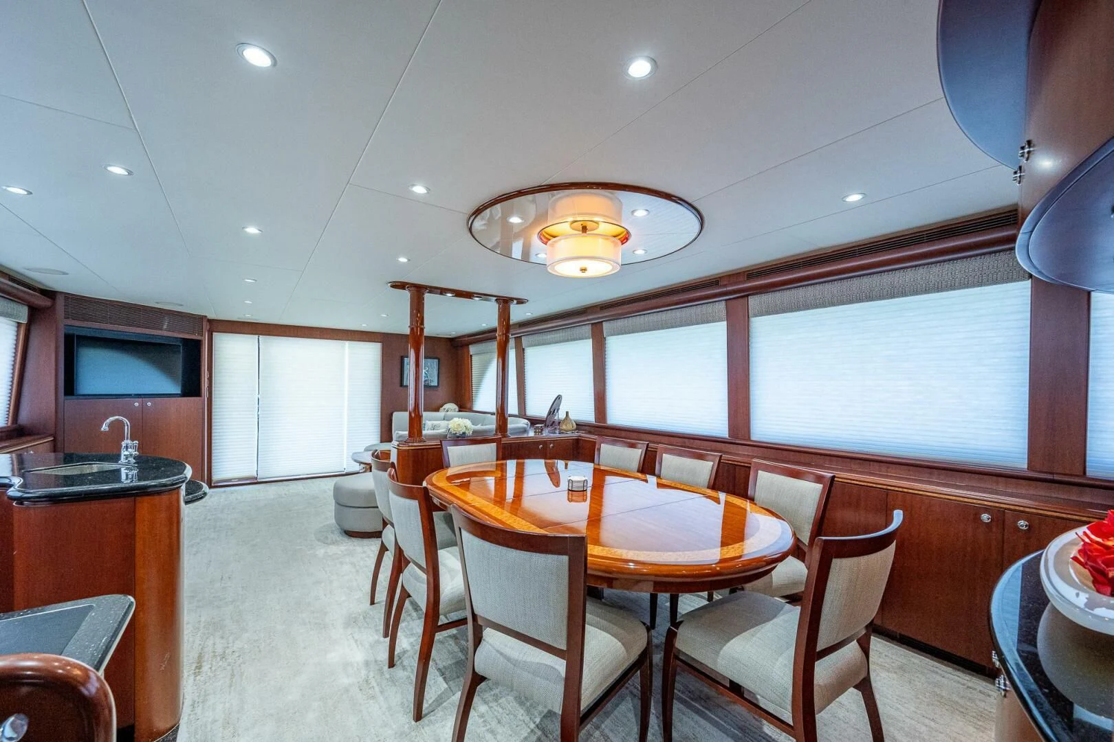 a dining room with a table and chairs aboard LADY LORRAINE Yacht for Sale