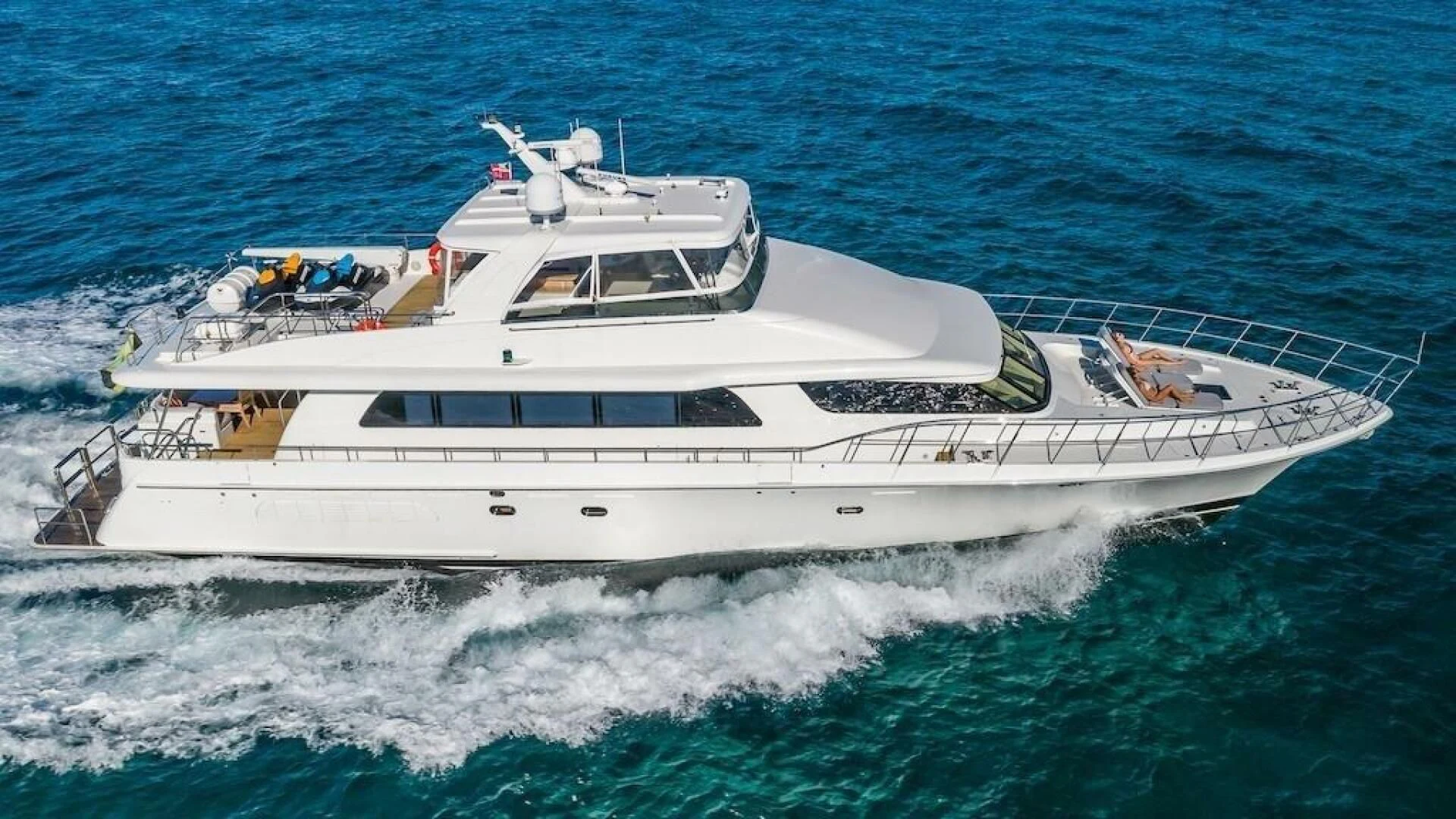 a white yacht on the water aboard LADY LORRAINE Yacht for Sale