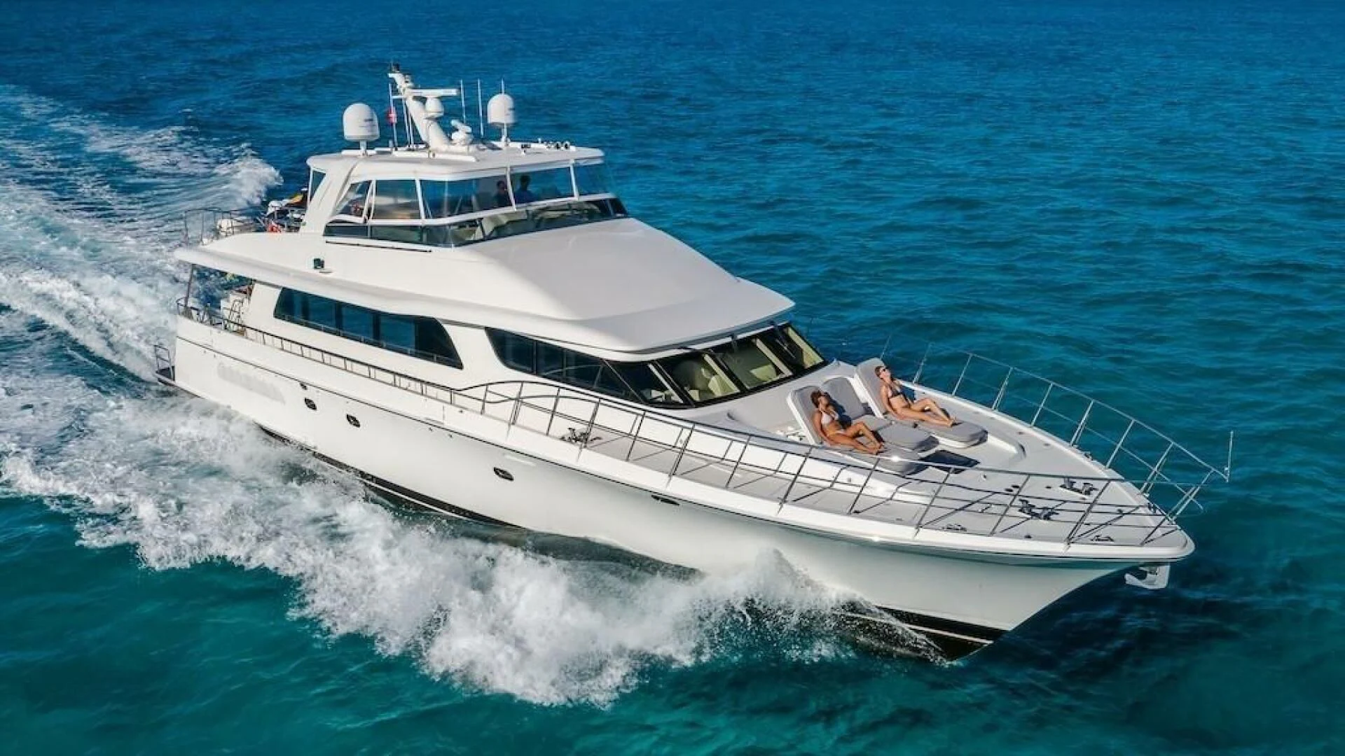 a white boat on the water aboard LADY LORRAINE Yacht for Sale