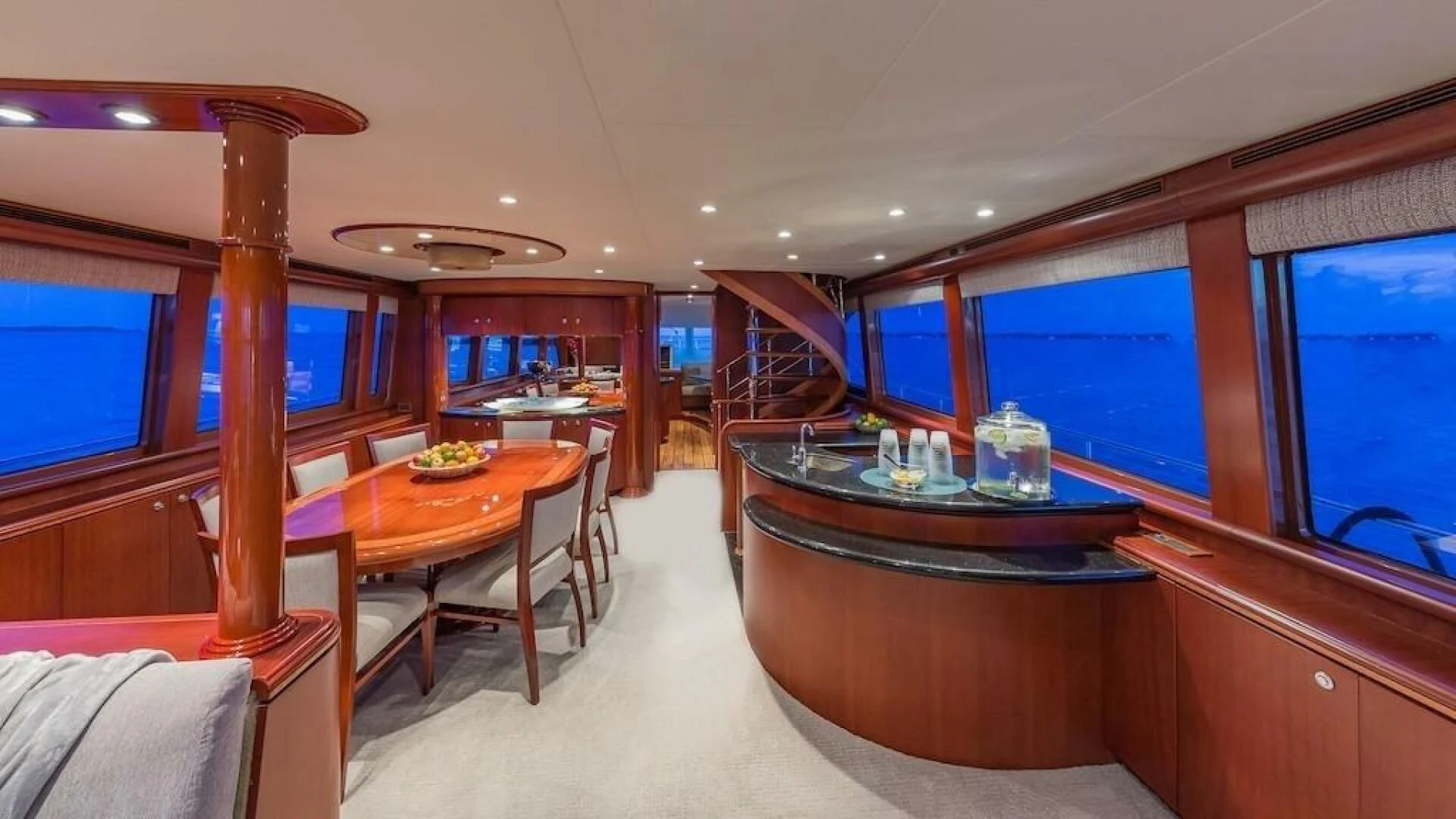 a room with a table and chairs aboard LADY LORRAINE Yacht for Sale