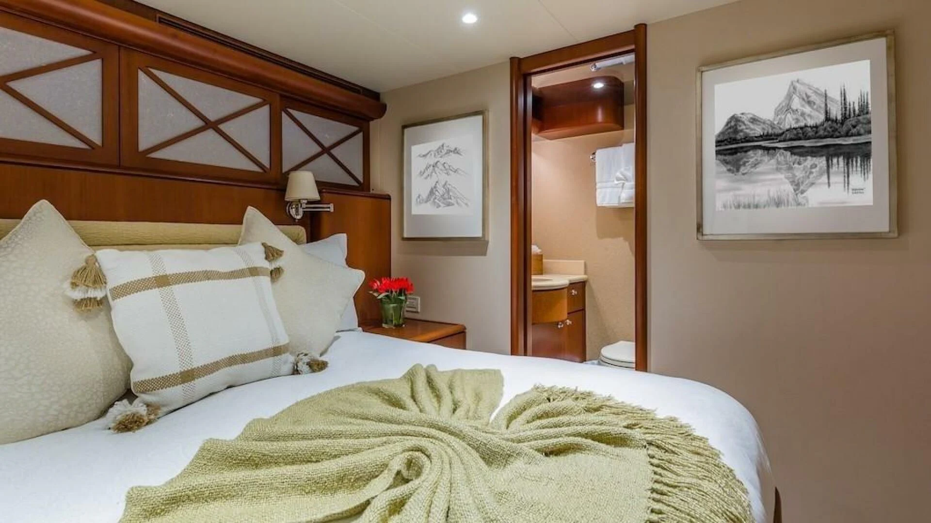 a bed with white sheets and pillows aboard LADY LORRAINE Yacht for Sale