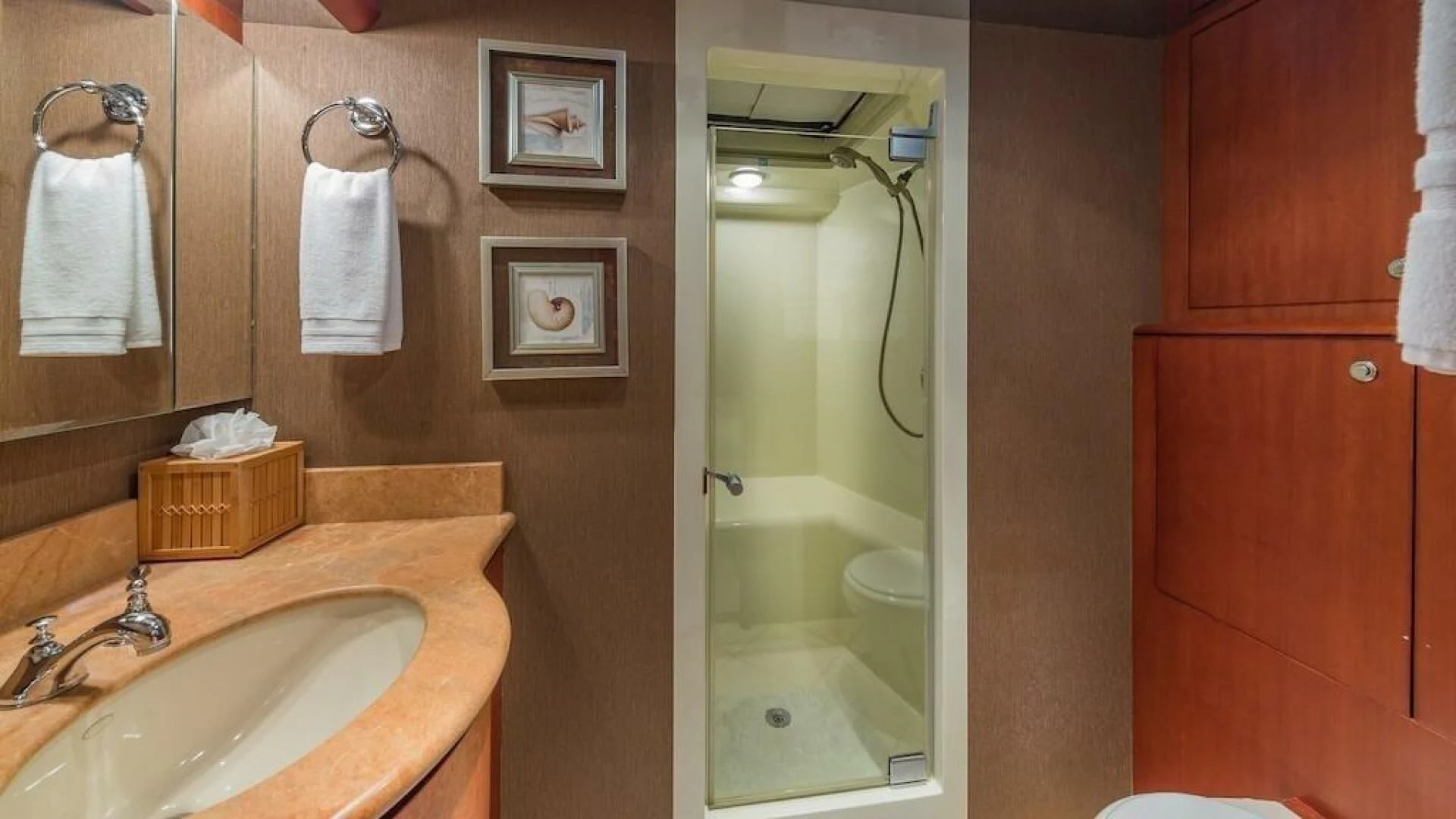 a bathroom with a sink and a shower aboard LADY LORRAINE Yacht for Sale