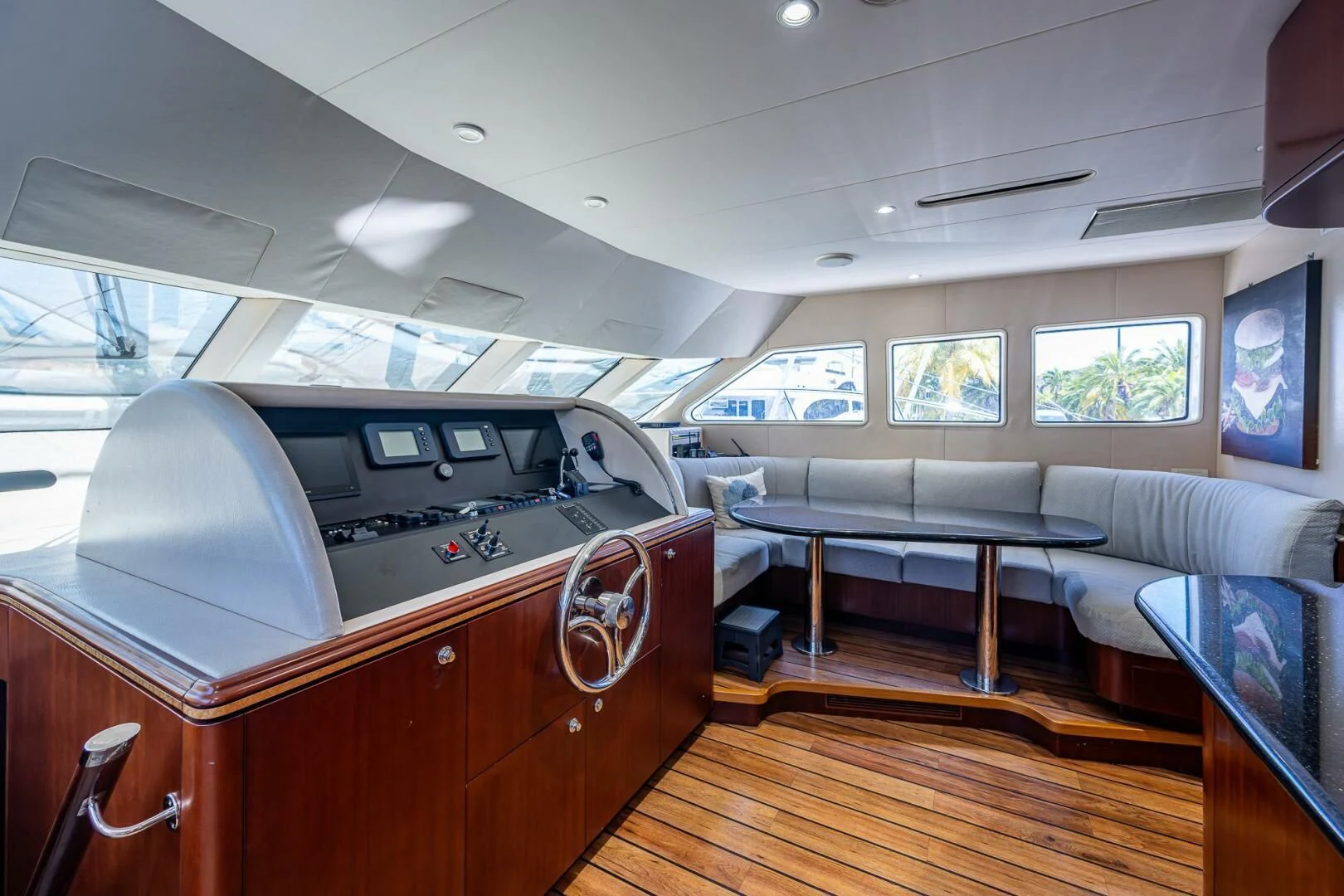 a kitchen with a couch and a table aboard LADY LORRAINE Yacht for Sale