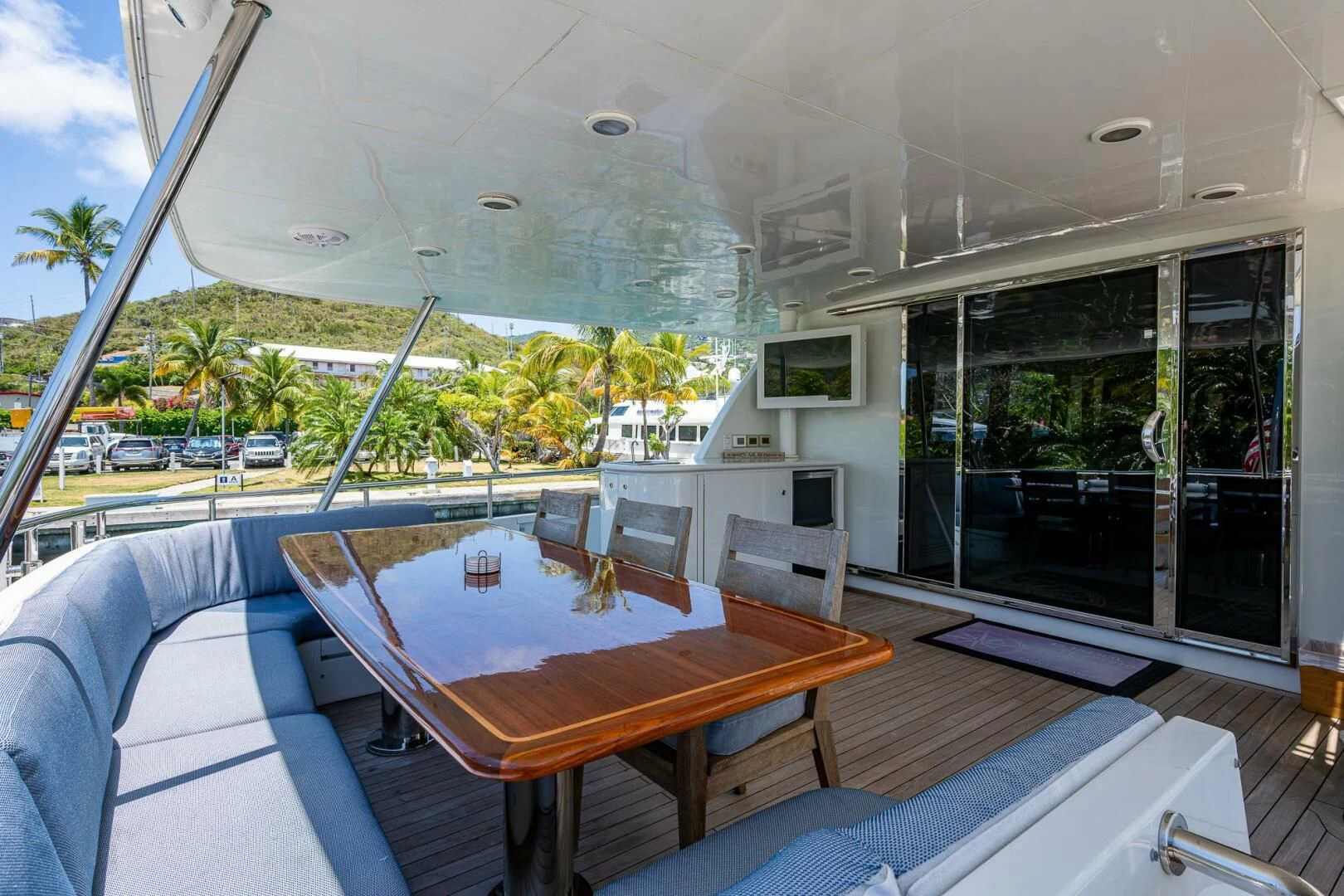 a deck with a pool and a deck with trees and grass aboard LADY LORRAINE Yacht for Sale