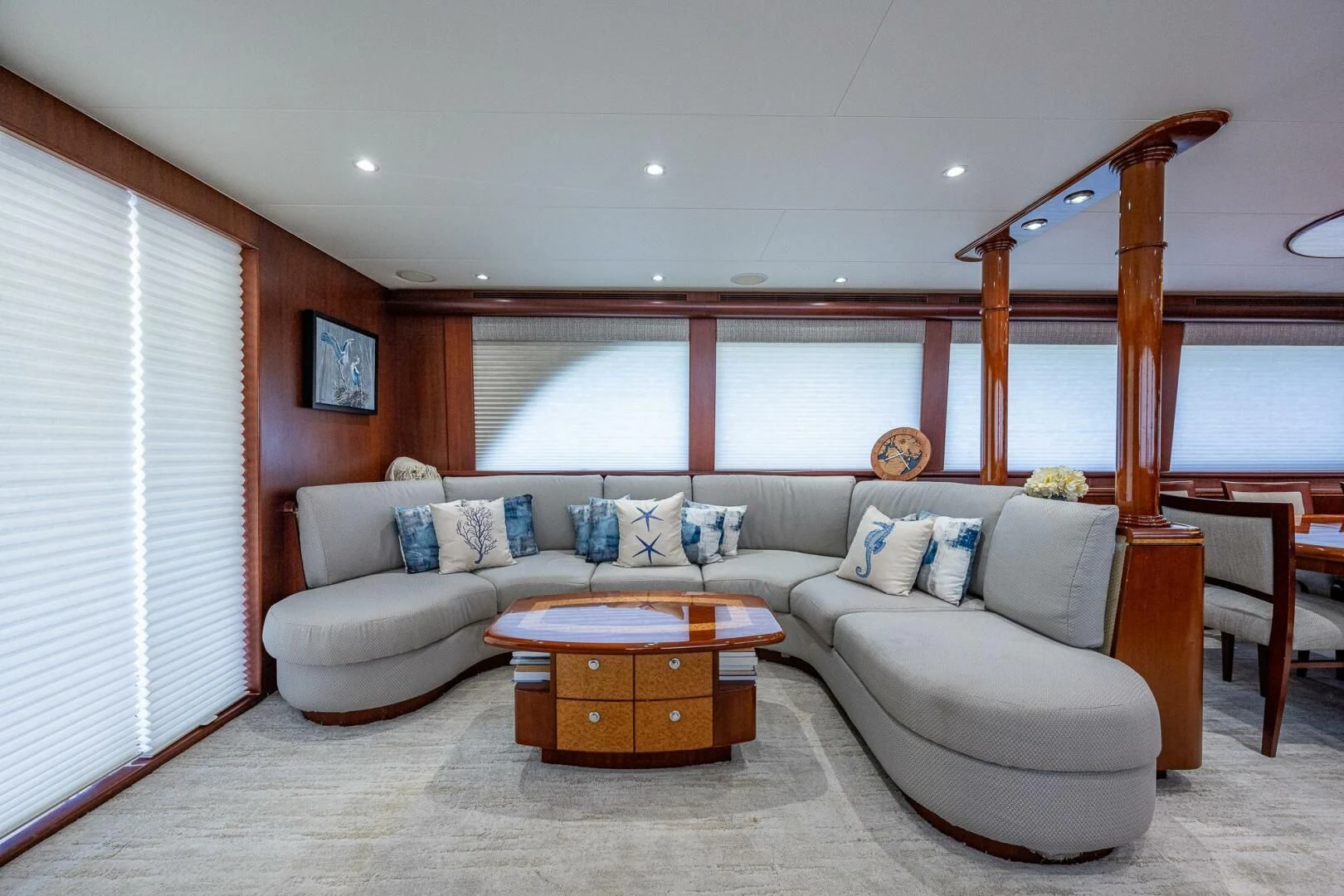 a living room with a large window aboard LADY LORRAINE Yacht for Sale