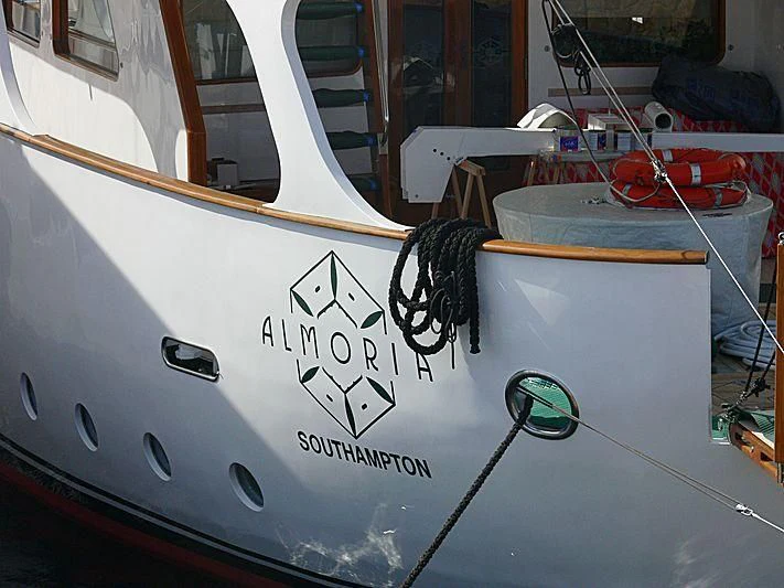 a large white object with black text on it aboard ALMORIA Yacht for Sale