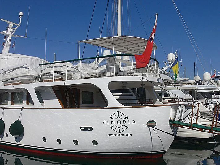 a boat docked at a pier aboard ALMORIA Yacht for Sale