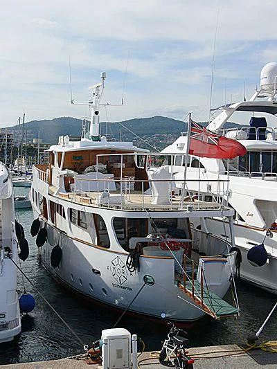 a boat docked at a pier aboard ALMORIA Yacht for Sale