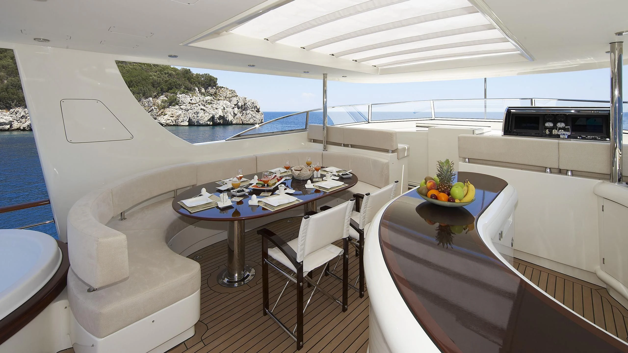 a modern kitchen with white furniture aboard CYRUS ONE Yacht for Sale