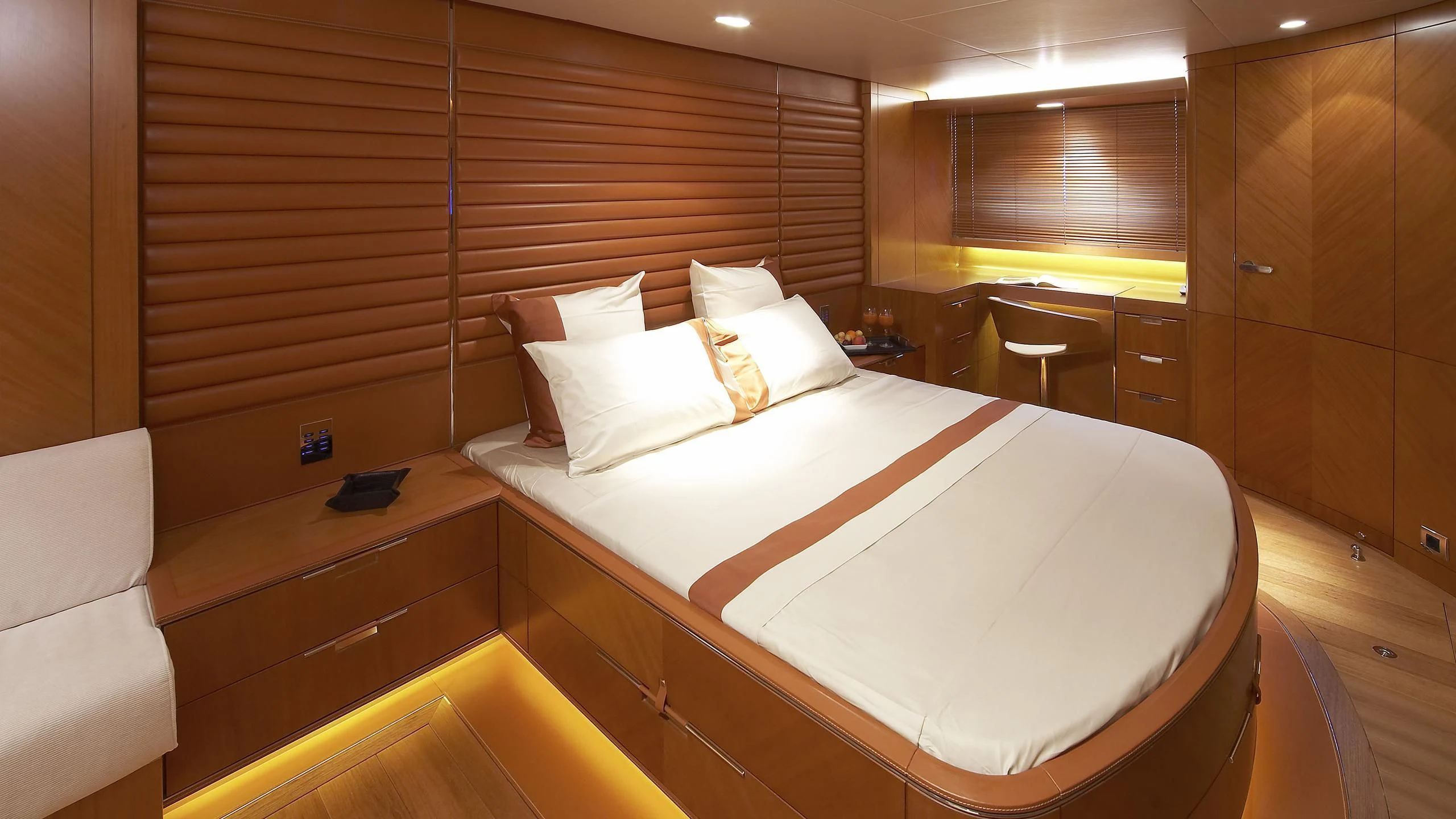 a bed with white sheets aboard CYRUS ONE Yacht for Sale