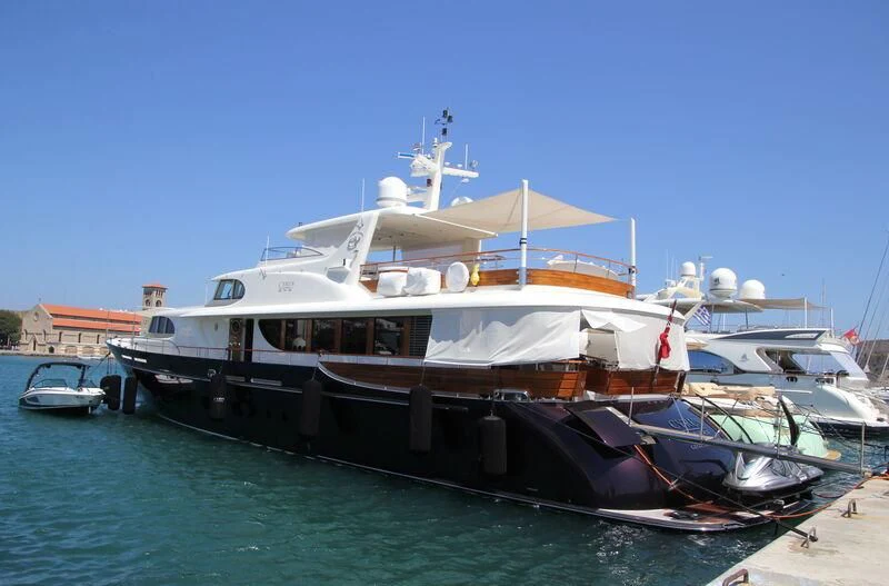 a large boat in the water aboard CYRUS ONE Yacht for Sale