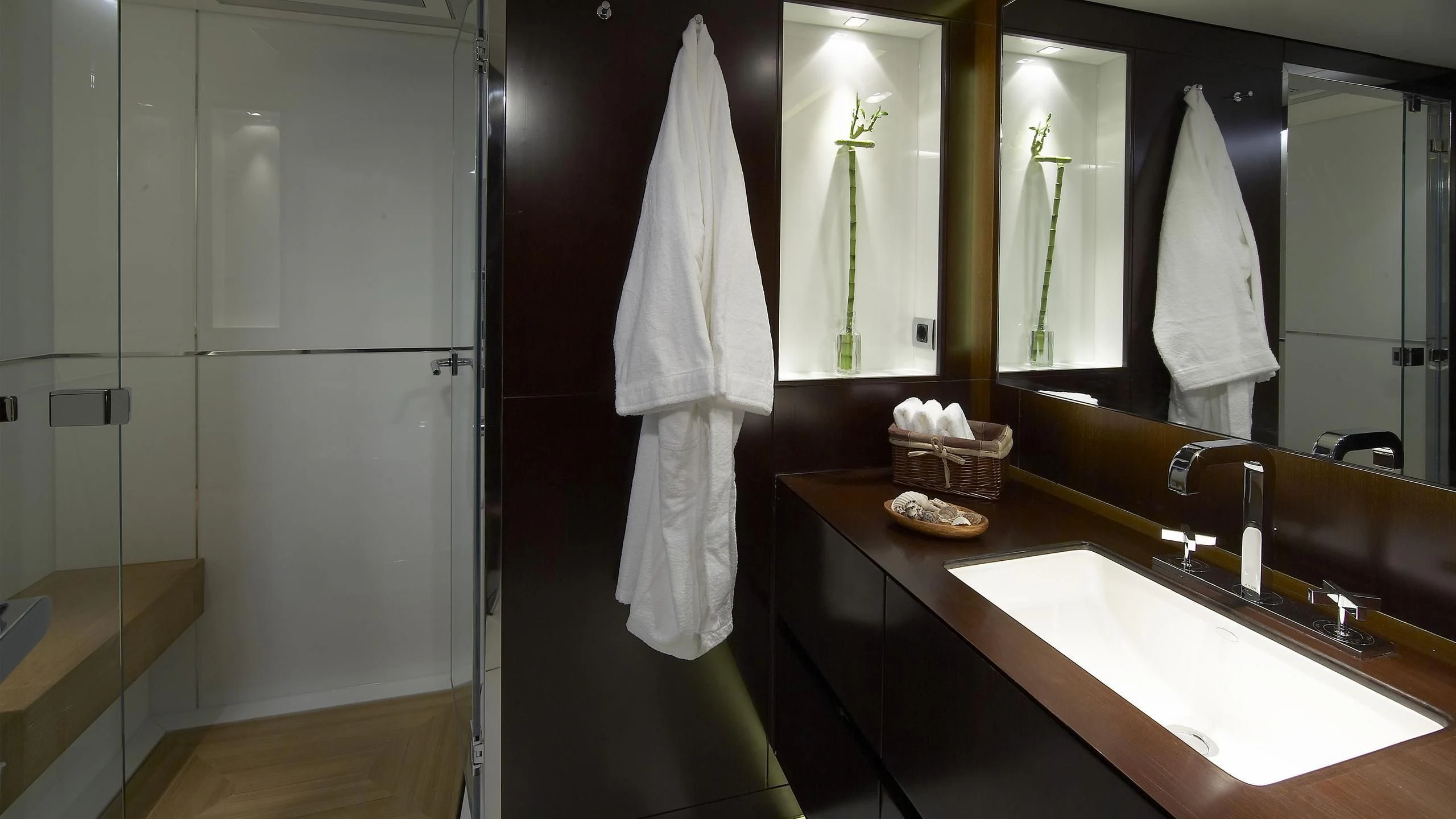 a bathroom with a sink and a mirror aboard CYRUS ONE Yacht for Sale