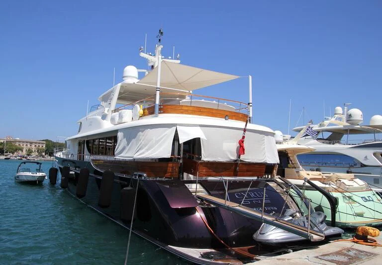 a boat docked at a pier aboard CYRUS ONE Yacht for Sale