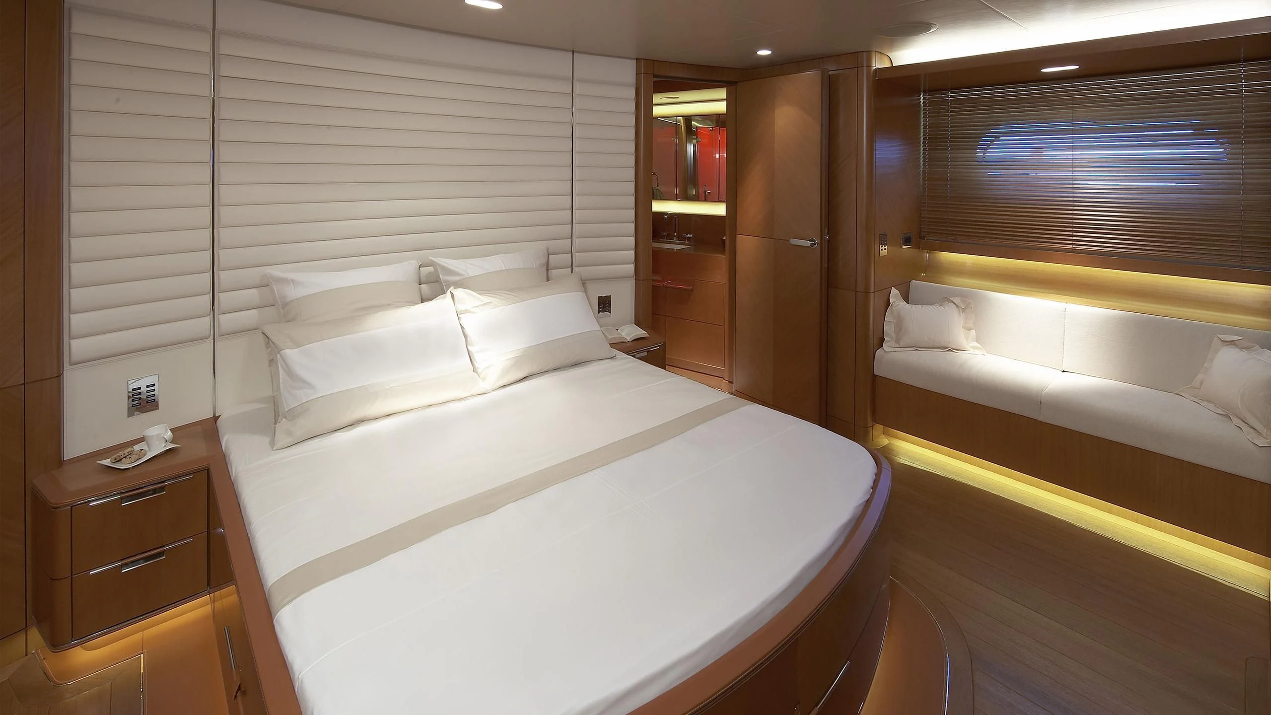 a room with a bed and a window aboard CYRUS ONE Yacht for Sale