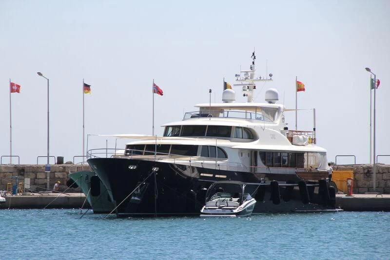 a boat docked at a pier aboard CYRUS ONE Yacht for Sale
