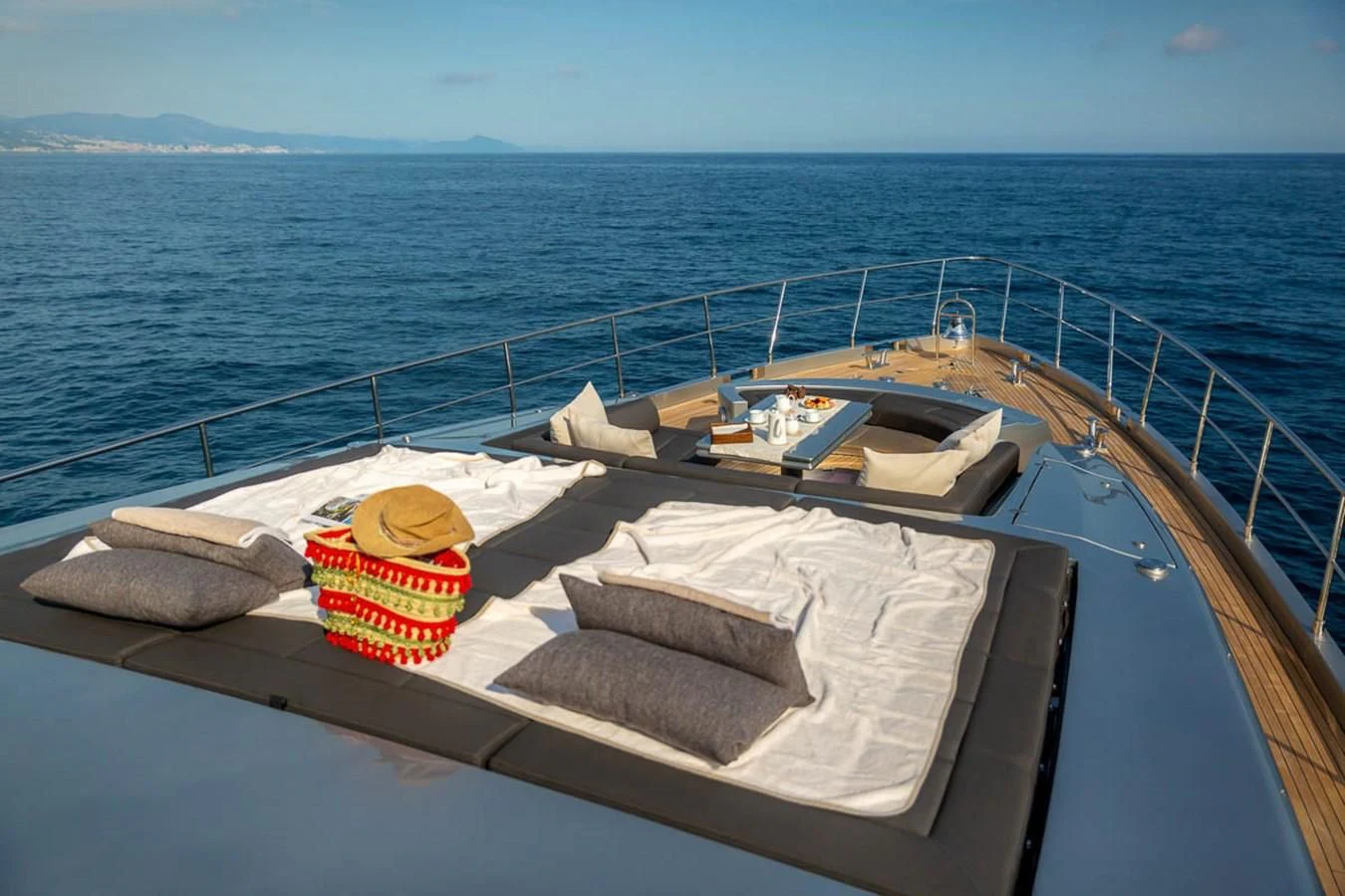 a boat with towels and pillows on it aboard X-TREM II Yacht for Sale