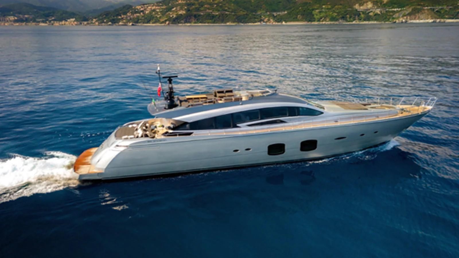 a white yacht on the water aboard X-TREM II Yacht for Sale