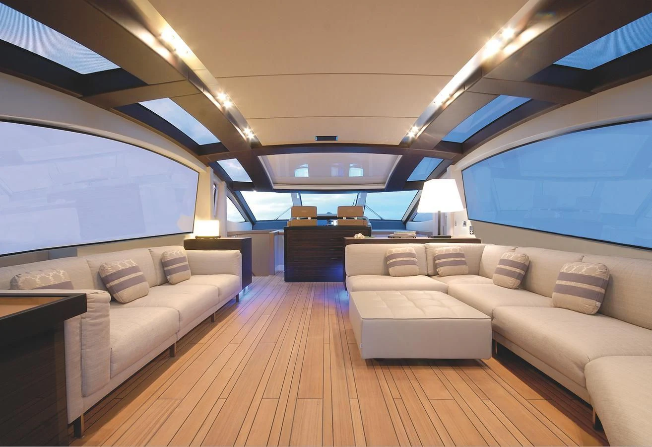 a living room with a couch and a tv aboard 2024 GLADIATOR 901 SPEED Yacht for Sale