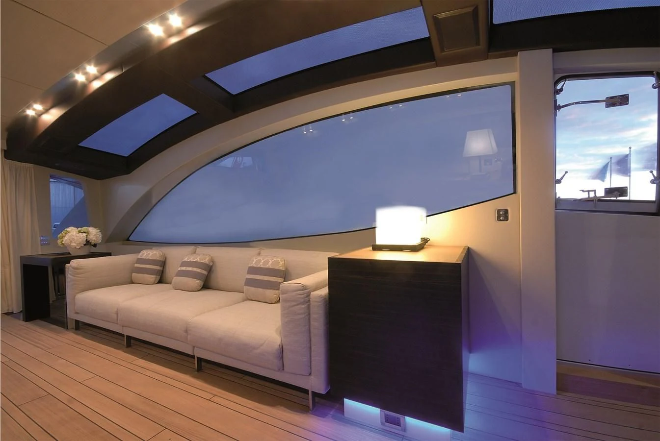 a room with a large blue screen aboard 2024 GLADIATOR 901 SPEED Yacht for Sale