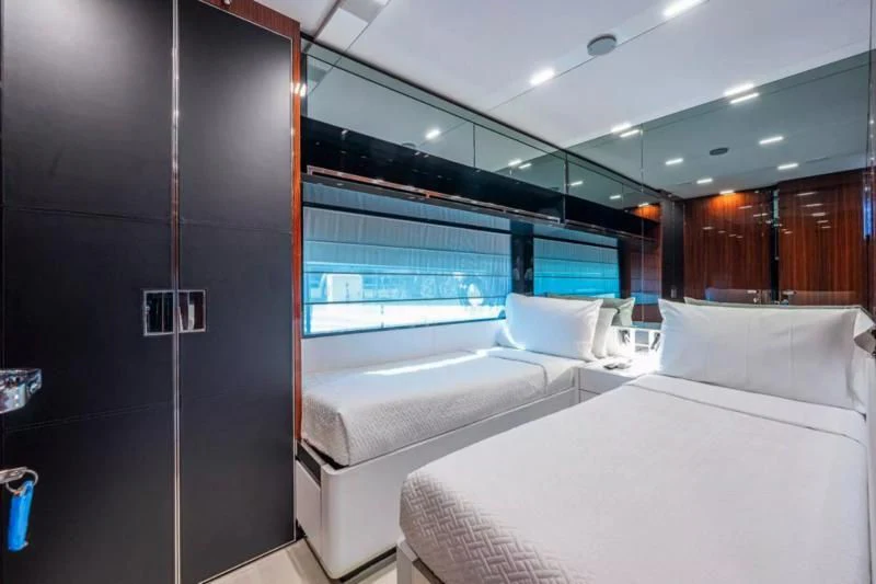 a room with a bed and a window aboard RIVA FOLGORE 88/14 Yacht for Sale