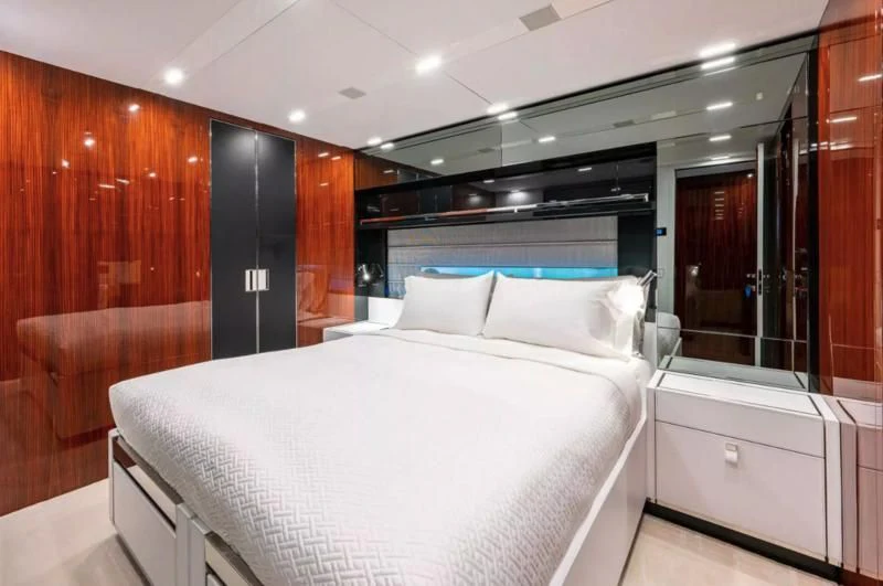 a bed in a room aboard RIVA FOLGORE 88/14 Yacht for Sale