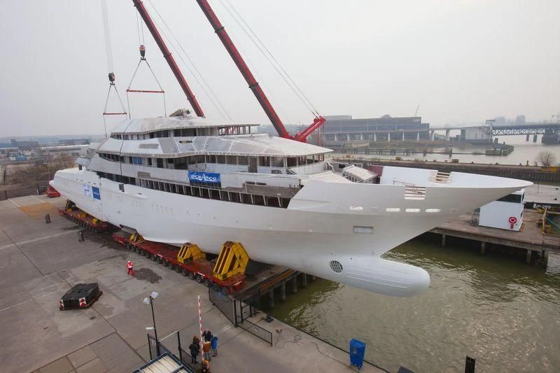 a large cruise ship docked aboard AMORE VERO Yacht for Sale