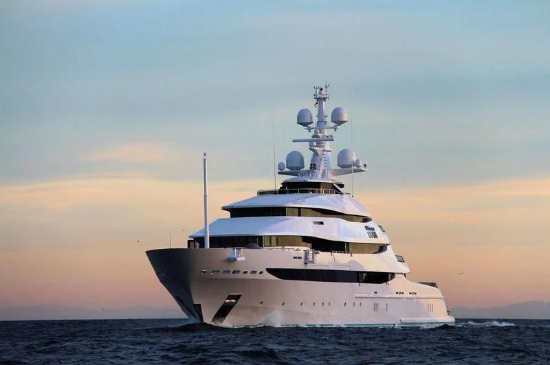 a large white ship in the water aboard AMORE VERO Yacht for Sale