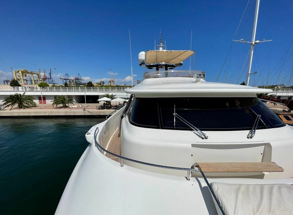 a boat with a large boat on it aboard BIM Yacht for Sale