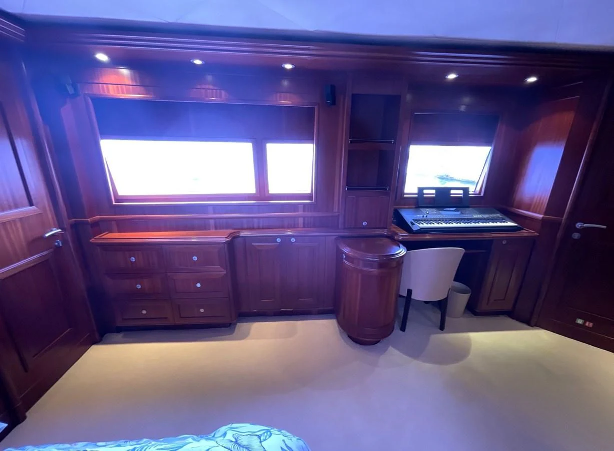 a room with a desk and a chair aboard BIM Yacht for Sale
