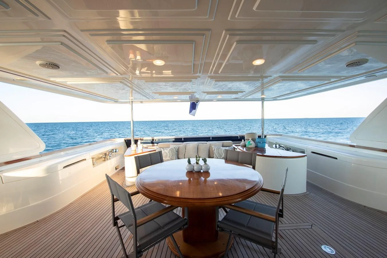 a table and chairs on a boat aboard BIM Yacht for Sale